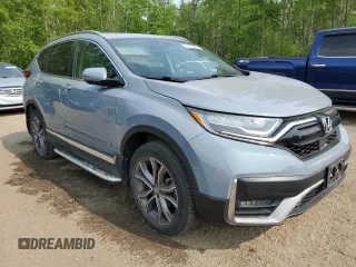2020 Honda CR-V Touring z VIN 2HKRW2H9XLH236764, wystawiony jako Copart lot #59693475 z przebiegiem Nie podano mil oraz Czysty tytuł • Clean title. Historia ofert i sprzedaży dostępna na DreamBid. Obrazek 4.