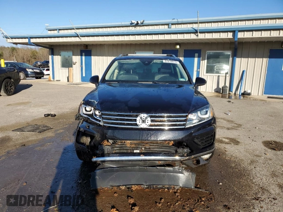 2016 Volkswagen Touareg Sport z VIN WVGEP9BP3GD004865, wystawiony jako Copart lot #87610915 z przebiegiem Nie podano mil oraz Szkoda całkowita • Salvage title. Historia ofert i sprzedaży dostępna na DreamBid. Obrazek 5.