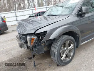 2015 Dodge Journey Crossroad with VIN 3C4PDCGB0FT639390, listed as a IAAI auction lot 41881370 with 164,219 mi miles and . Bid and sale history available at DreamBid. Image 6.