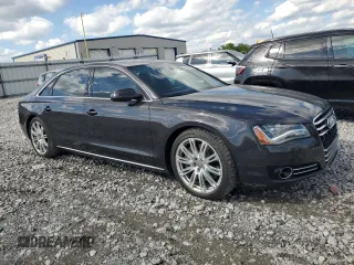 2014 Audi A8 4.0T с VIN WAUR2AFDXEN011628, выставлен на аукционе Copart как лот 55423285 с пробегом 94 681 миль миль и Списание • Salvage title. История ставок и продаж доступна на DreamBid. Изображение 4.