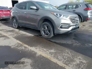 2017 Hyundai Santa Fe 2.4L with VIN 5XYZTDLB9HG440064, listed as a IAAI auction lot 42061524 with 140,365 mi miles and . Bid and sale history available at DreamBid. Image 1.