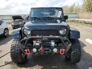 2016 Jeep Wrangler Sport with VIN 1C4AJWAG8GL134327, listed as a Copart auction lot 55039655 with 110,878 mi miles and Clean Title. Bid and sale history available at carsss.com. Image 5.