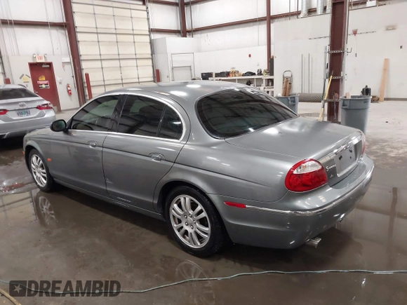 2005 Jaguar S-Type with VIN SAJWA01T85FN43991, listed as a IAAI auction lot 42055271 with 114,454 mi miles and . Bid and sale history available at DreamBid. Image 3.