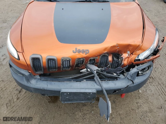 2015 Jeep Cherokee Trailhawk with VIN 1C4PJMBSXFW704942, listed as a Copart auction lot 85514044 with 194,340 mi miles and Salvage Title. Bid and sale history available at carsss.com. Image 13.