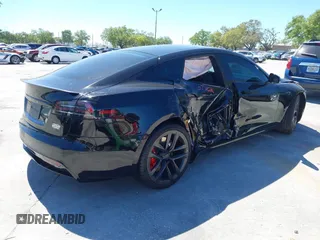 2023 Tesla Model S Plaid with VIN 5YJSA1E67PF528171, listed as a IAAI auction lot 41831086 with Not provided miles and . Bid and sale history available at DreamBid. Image 4.