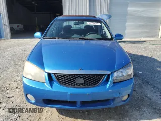 2005 Kia Spectra LX z VIN KNAFE121655113045, wystawiony jako Copart lot #61199595 z przebiegiem 156 310 mil mil oraz Szkoda całkowita • Salvage title. Historia ofert i sprzedaży dostępna na DreamBid. Obrazek 5.
