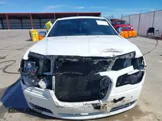 2011 Chrysler 300 with VIN 2C3CA6CTXBH559626, listed as a IAAI auction lot 41876062 with 112,045 mi miles. Bid and sale history available at carsss.com. Image 6.