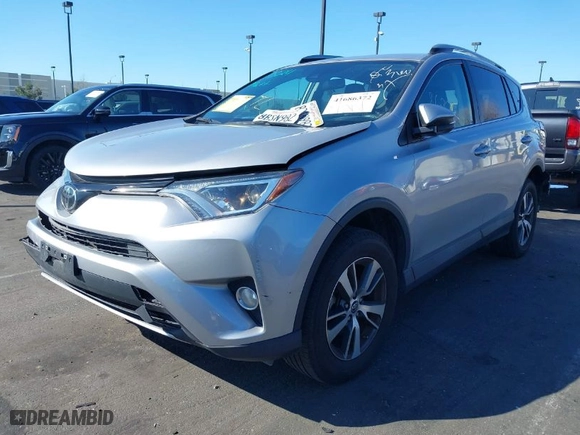 2018 Toyota RAV4 XLE with VIN 2T3WFREV7JW408039, listed as a IAAI auction lot 41686372 with 94,125 mi miles. Bid and sale history available at carsss.com. Image 2.