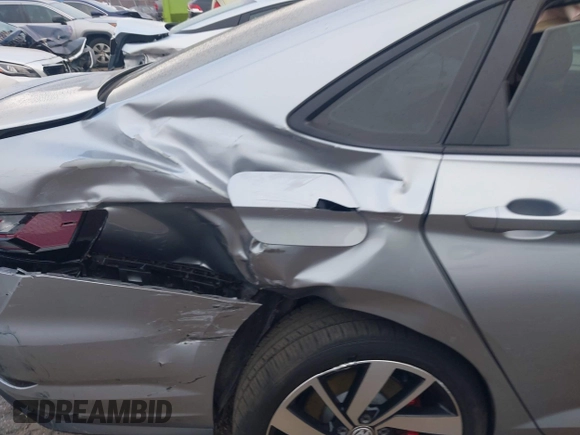 2019 Volkswagen Jetta GLI S z VIN 3VW5T7BU4KM165083, wystawiony jako IAAI lot #40729763 z przebiegiem 75 414 mil mil oraz . Historia ofert i sprzedaży dostępna na DreamBid. Obrazek 6.