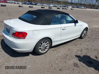 2010 BMW 1 Series 128i with VIN WBAUL7C53AVJ77801, listed as a IAAI auction lot 42048295 with 152,176 mi miles and . Bid and sale history available at carsss.com. Image 4.