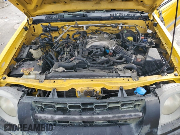 2002 Nissan Xterra XE z VIN 5N1ED28T52C550540, wystawiony jako Copart lot #89154135 z przebiegiem 296 868 mil mil oraz Szkoda całkowita • Salvage title. Historia ofert i sprzedaży dostępna na DreamBid. Obrazek 12.