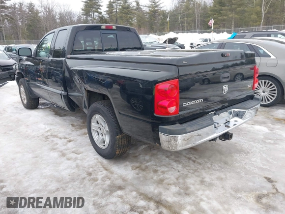 2005 Dodge Dakota SLT with VIN 1D7HE42K75S140168, listed as a IAAI auction lot 41581634 with 121,983 mi miles and . Bid and sale history available at carsss.com. Image 3.