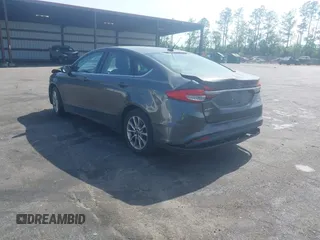 2017 Ford Fusion SE z VIN 3FA6P0H76HR259097, wystawiony jako IAAI lot #42133090 z przebiegiem 187 400 mil mil oraz . Historia ofert i sprzedaży dostępna na DreamBid. Obrazek 3.