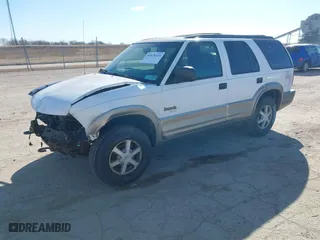 2001 Oldsmobile Bravada with VIN 1GHDT13W512107415, listed as a IAAI auction lot 41678324 with 256,968 mi miles. Bid and sale history available at carsss.com. Image 2.