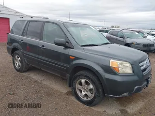 2006 Honda Pilot EX with VIN 2HKYF18426H502390, listed as a IAAI auction lot 42146354 with 164,937 mi miles and . Bid and sale history available at DreamBid. Image 1.