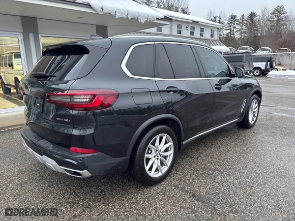 2021 BMW X5 sDrive40i with VIN 5UXCR4C04M9G59370, listed as a IAAI auction lot 41592538 with 132,083 mi miles. Bid and sale history available at carsss.com. Image 4.