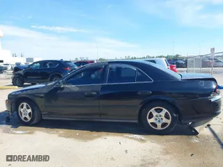 2000 Lincoln LS with VIN 1LNHM86S4YY818127, listed as a IAAI auction lot 41329978 with 158,134 mi miles. Bid and sale history available at carsss.com. Image 15.