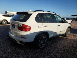 2013 BMW X5 xDrive50i with VIN 5UXZV8C55D0C16304, listed as a Copart auction lot 53406135 with 103,704 mi miles and Salvage title. Bid and sale history available at DreamBid. Image 3.