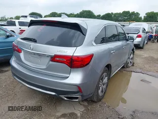 2020 Acura MDX with VIN 5J8YD3H32LL016504, listed as a IAAI auction lot 42126961 with 90,307 mi miles and . Bid and sale history available at DreamBid. Image 4.