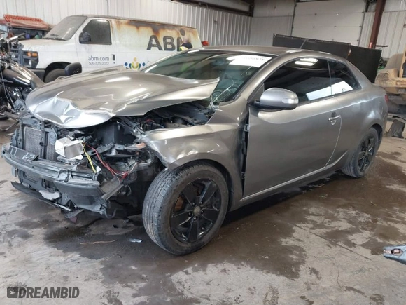 2010 Kia Forte Koup EX with VIN KNAFU6A22A5250830, listed as a IAAI auction lot 41680828 with 181006 miles. Bid and sale history available at carsss.com. Image 2.