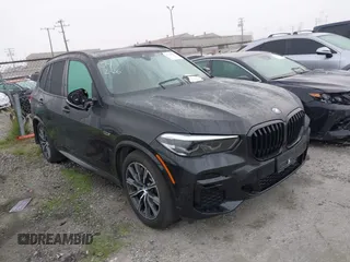 2022 BMW X5 xDrive45e with VIN 5UXTA6C09N9M81408, listed as a IAAI auction lot 41448822 with 35,147 mi miles. Bid and sale history available at carsss.com. Image 1.