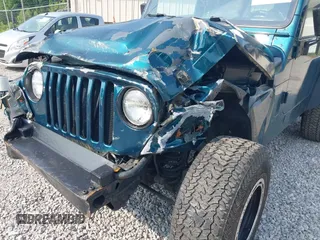 1998 Jeep Wrangler Sport with VIN 1J4FY19S2WP786844, listed as a IAAI auction lot 42382789 with 306,228 mi miles and . Bid and sale history available at DreamBid. Image 6.