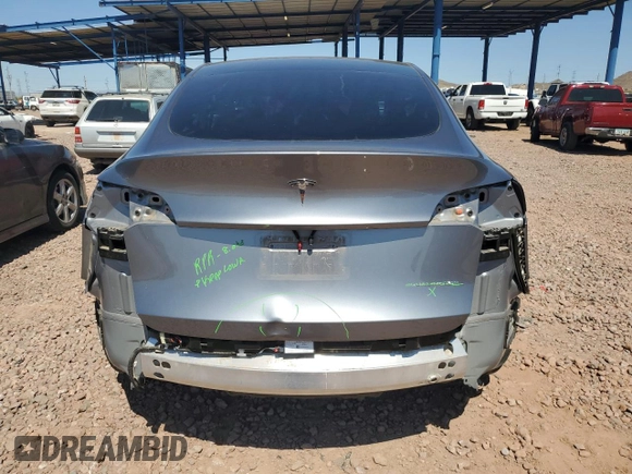 2024 Tesla Model Y Long Range z VIN 7SAYGDEE6RA322800, wystawiony jako Copart lot #49470595 z przebiegiem 16 372 mil mil oraz Szkoda całkowita • Salvage title. Historia ofert i sprzedaży dostępna na DreamBid. Obrazek 6.