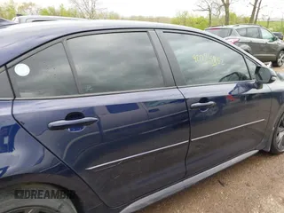 2023 Toyota Corolla SE with VIN 5YFS4MCE2PP143401, listed as a IAAI auction lot 42085852 with 50,959 mi miles and . Bid and sale history available at DreamBid. Image 13.