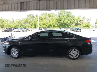 2015 Ford Fusion SE Hybrid with VIN 3FA6P0LU5FR102185, listed as a IAAI auction lot 42453553 with 172,230 mi miles and . Bid and sale history available at DreamBid. Image 14.