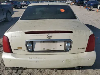 2003 Cadillac DeVille DHS z VIN 1G6KE57Y03U116432, wystawiony jako Copart lot #85949594 z przebiegiem 204 321 mil mil oraz Czysty tytuł • Clean title. Historia ofert i sprzedaży dostępna na DreamBid. Obrazek 6.