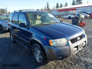 2004 Ford Escape XLT with VIN 1FMYU03134KA30806, listed as a IAAI auction lot 41449933 with 137,897 mi miles. Bid and sale history available at carsss.com. Image 13.
