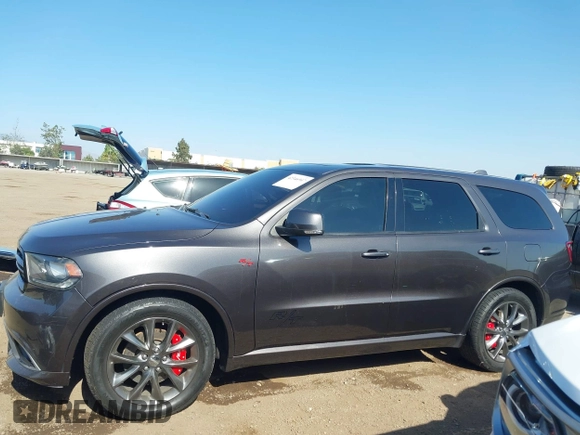 2014 Dodge Durango R/T z VIN 1C4SDJCT5EC591649, wystawiony jako IAAI lot #42346947 z przebiegiem 143 143 mil mil oraz . Historia ofert i sprzedaży dostępna na DreamBid. Obrazek 14.