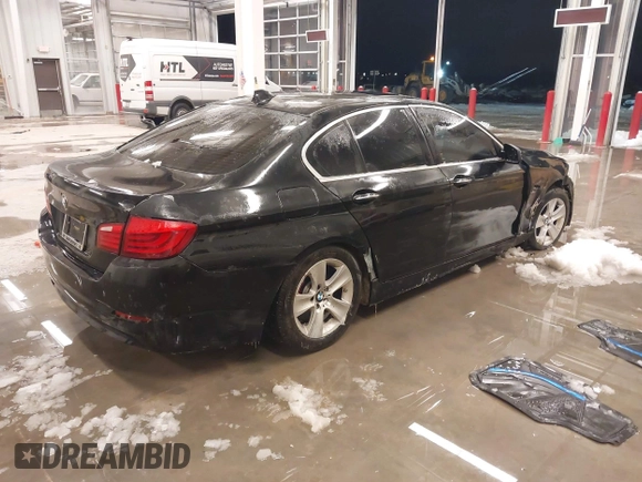 2012 BMW 5 Series 528i xDrive with VIN WBAXH5C51CDW03156, listed as a IAAI auction lot 41236722 with 189,196 mi miles and . Bid and sale history available at DreamBid. Image 4.