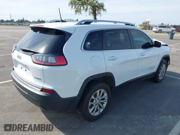2019 Jeep Cherokee Latitude with VIN 1C4PJMCB5KD212940, listed as a IAAI auction lot 41762856 with 86,777 mi miles. Bid and sale history available at carsss.com. Image 4.
