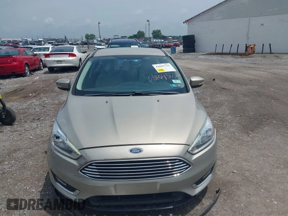 2015 Ford Focus Titanium с VIN 1FADP3N2XFL367753, выставлен на аукционе IAAI как лот 42695722 с пробегом 26 565 миль миль и . История ставок и продаж доступна на DreamBid. Изображение 12.