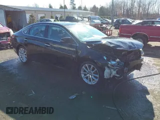 2014 Toyota Avalon Limited with VIN 4T1BK1EB9EU107532, listed as a IAAI auction lot 41389320 with 85,902 mi miles. Bid and sale history available at carsss.com. Image 1.