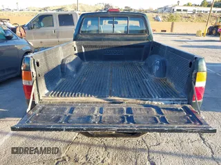 1994 Toyota Pickup with VIN JT4RN81A2R5194383, listed as a IAAI auction lot 41587661 with 262,153 mi miles and . Bid and sale history available at DreamBid. Image 8.