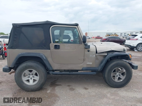 2005 Jeep Wrangler X with VIN 1J4FA39S55P350696, listed as a IAAI auction lot 42367283 with 117,941 mi miles and . Bid and sale history available at DreamBid. Image 13.