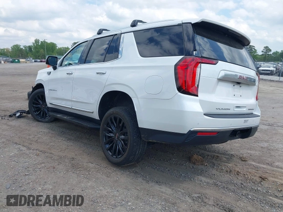 2023 GMC Yukon Denali with VIN 1GKS2DKT6PR245476, listed as a IAAI auction lot 42053782 with 51,598 mi miles. Bid and sale history available at carsss.com. Image 3.