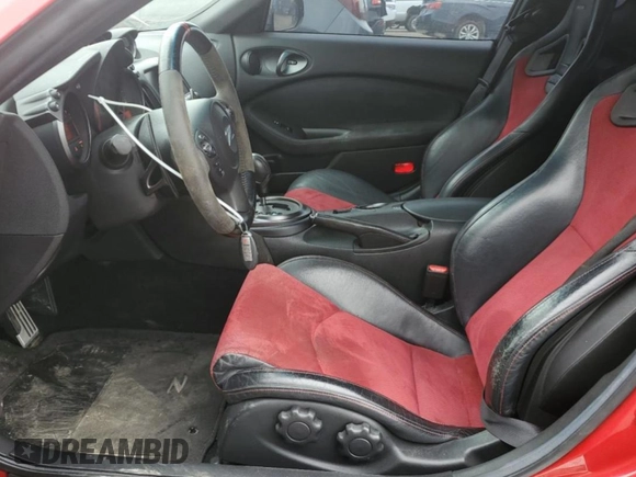 2015 Nissan 370Z z VIN JN1AZ4EH6FM442575, wystawiony jako Copart lot #57146915 z przebiegiem 57 020 mil mil oraz Czysty tytuł • Clean title. Historia ofert i sprzedaży dostępna na DreamBid. Obrazek 7.