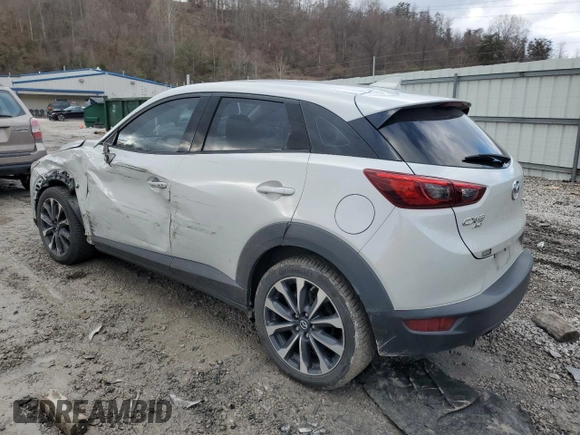 2019 Mazda CX-3 Touring with VIN JM1DKFC78K0405131, listed as a Copart auction lot 87065614 with 91,091 mi miles and Salvage Title. Bid and sale history available at carsss.com. Image 2.