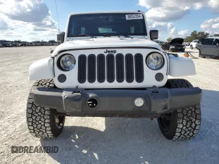 2015 Jeep Wrangler Unlimited Sahara with VIN 1C4BJWEG6FL614671, listed as a Copart auction lot 86052284 with 92,894 mi miles and Salvage title. Bid and sale history available at DreamBid. Image 5.