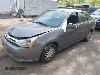2010 Ford Focus SE with VIN 1FAHP3FNXAW125238, listed as a IAAI auction lot 42109371 with 179,761 mi miles. Bid and sale history available at carsss.com. Image 2.