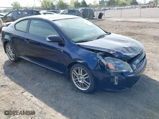 2007 Scion tC Spec with VIN JTKDE177770186408, listed as a IAAI auction lot 42100201 with 219,506 mi miles. Bid and sale history available at carsss.com. Image 1.