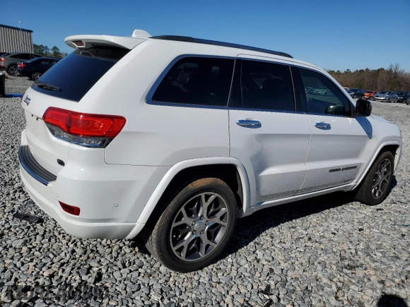 2019 Jeep Grand Cherokee Overland with VIN 1C4RJECG2KC543474, listed as a Copart auction lot 87354084 with 86,076 mi miles and Salvage Title. Bid and sale history available at carsss.com. Image 3.