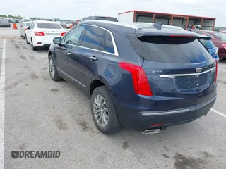 2019 Cadillac XT5 Luxury FWD with VIN 1GYKNCRS7KZ199542, listed as a IAAI auction lot 42032139 with 79,487 mi miles and . Bid and sale history available at DreamBid. Image 3.