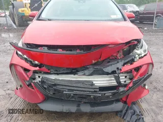 2021 Toyota Prius LE with VIN JTDKAMFP7M3178008, listed as a IAAI auction lot 42273697 with 110,605 mi miles and . Bid and sale history available at DreamBid. Image 6.