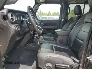2018 Jeep Wrangler Unlimited Sahara with VIN 1C4HJXEG0JW141101, listed as a Copart auction lot 56573195 with 143,854 mi miles and Salvage title. Bid and sale history available at DreamBid. Image 7.