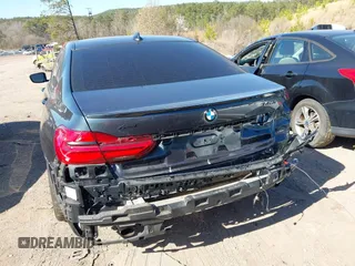 2017 BMW 7 Series 740i z VIN WBA7E2C57HG739465, wystawiony jako IAAI lot #41764778 z przebiegiem 84 814 mil mil oraz . Historia ofert i sprzedaży dostępna na DreamBid. Obrazek 6.