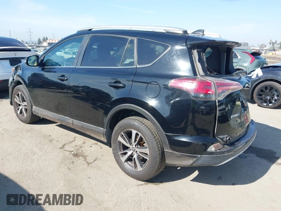 2016 Toyota RAV4 XLE with VIN 2T3RFREV6GW459313, listed as a IAAI auction lot 42074337 with 149,914 mi miles and . Bid and sale history available at DreamBid. Image 3.
